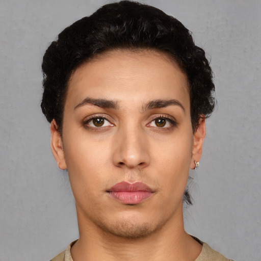Neutral white young-adult female with short  black hair and brown eyes