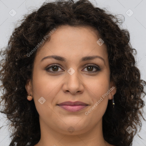 Joyful white adult female with long  brown hair and brown eyes