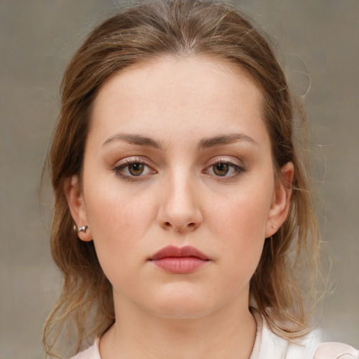 Neutral white young-adult female with medium  brown hair and brown eyes