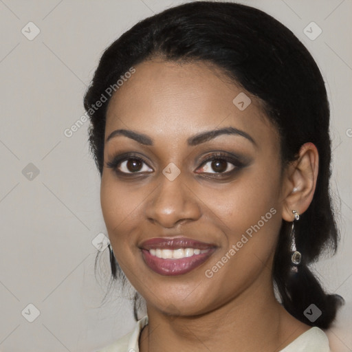 Joyful latino young-adult female with medium  black hair and brown eyes