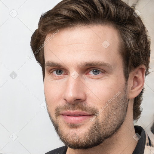 Neutral white young-adult male with short  brown hair and grey eyes