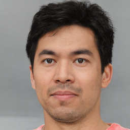 Neutral asian young-adult male with short  black hair and brown eyes