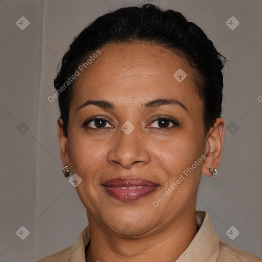 Joyful latino adult female with short  brown hair and brown eyes