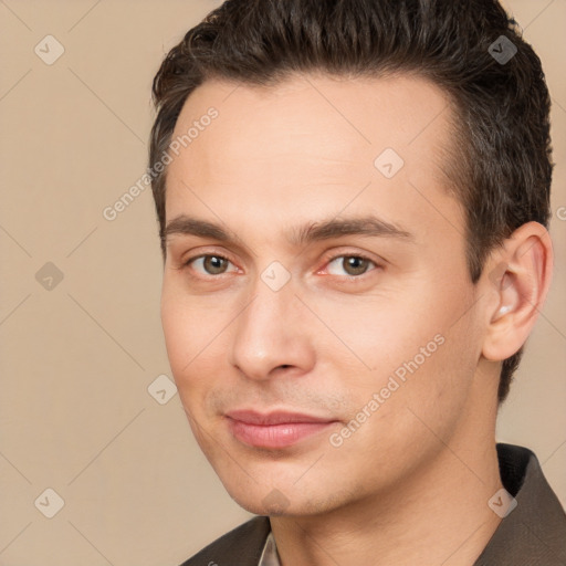 Joyful white young-adult male with short  brown hair and brown eyes