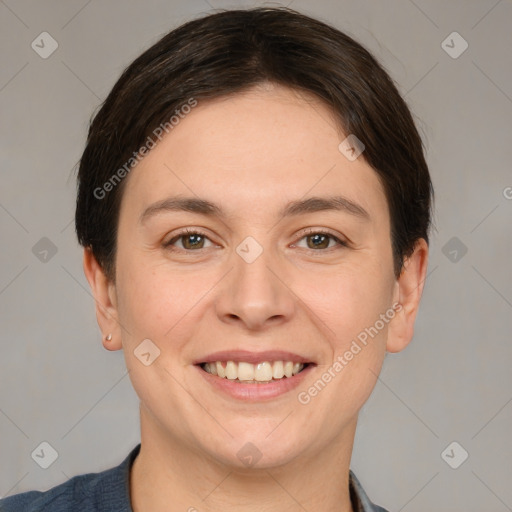 Joyful white young-adult female with short  brown hair and brown eyes