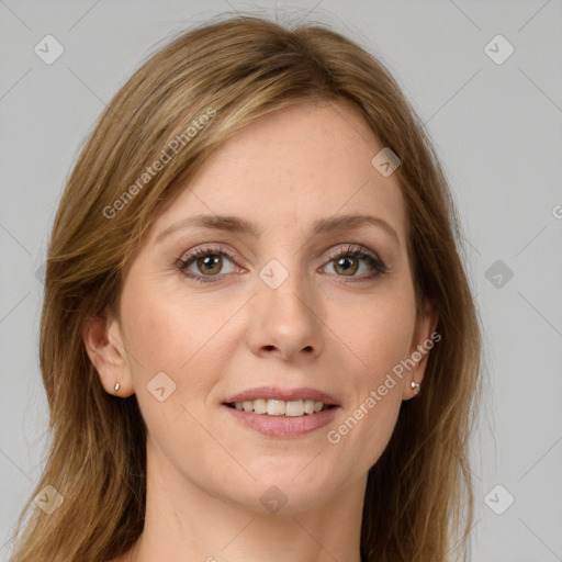 Joyful white young-adult female with long  brown hair and green eyes