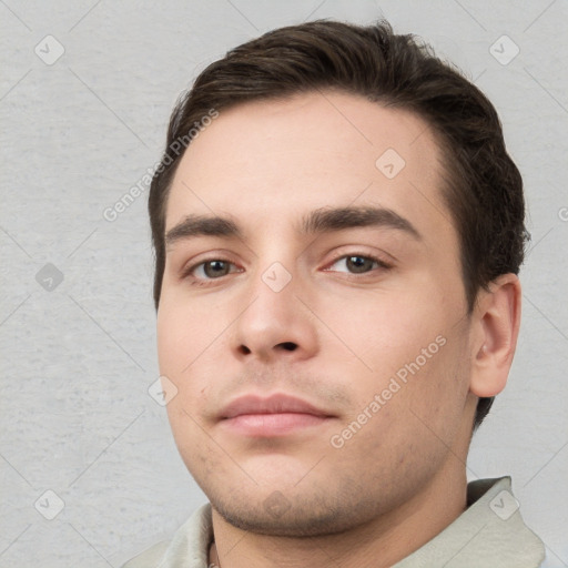 Neutral white young-adult male with short  brown hair and brown eyes