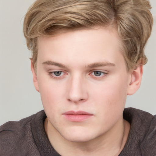 Neutral white young-adult male with short  brown hair and blue eyes