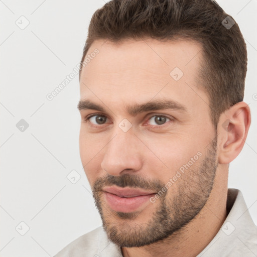 Joyful white young-adult male with short  brown hair and brown eyes