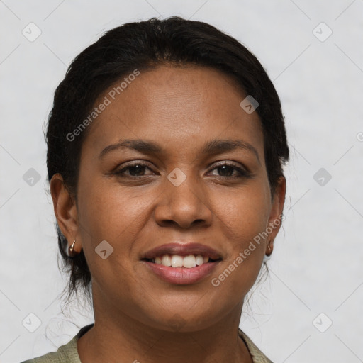 Joyful black young-adult female with short  brown hair and brown eyes
