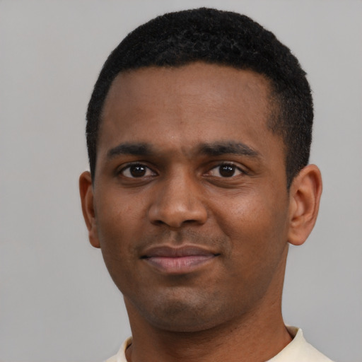 Neutral black young-adult male with short  black hair and brown eyes
