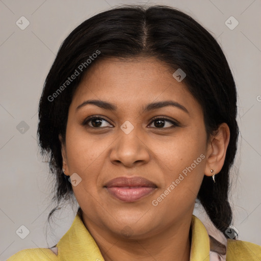 Joyful latino young-adult female with medium  brown hair and brown eyes