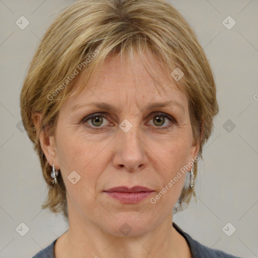 Joyful white adult female with medium  brown hair and grey eyes