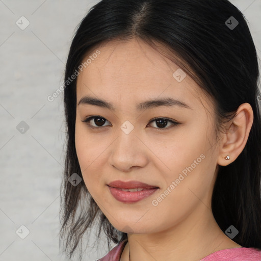 Joyful asian young-adult female with medium  brown hair and brown eyes