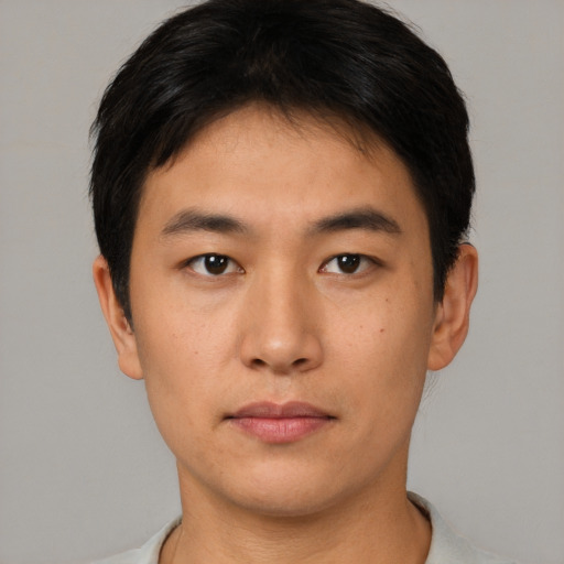 Neutral asian young-adult male with short  brown hair and brown eyes