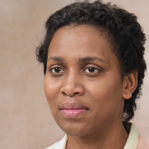 Neutral black young-adult female with short  brown hair and brown eyes