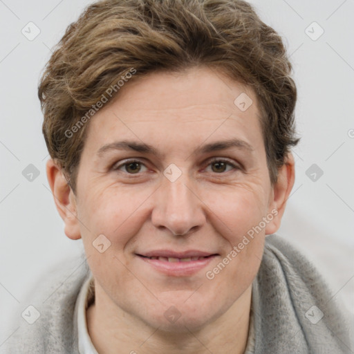 Joyful white adult female with short  brown hair and brown eyes