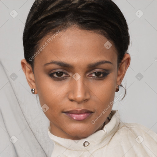 Joyful black young-adult female with short  brown hair and brown eyes