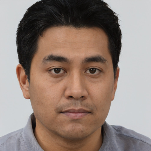 Neutral asian young-adult male with short  black hair and brown eyes