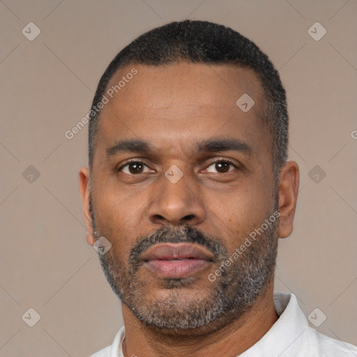 Neutral latino adult male with short  black hair and brown eyes