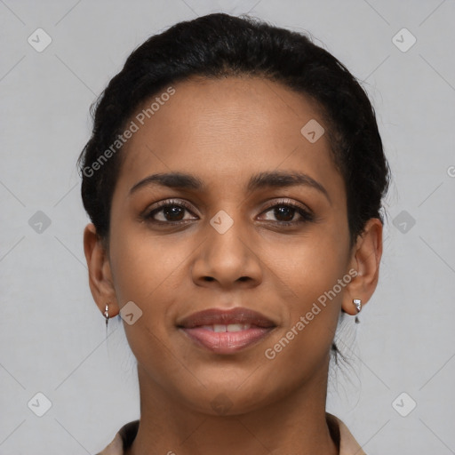 Joyful latino young-adult female with short  brown hair and brown eyes