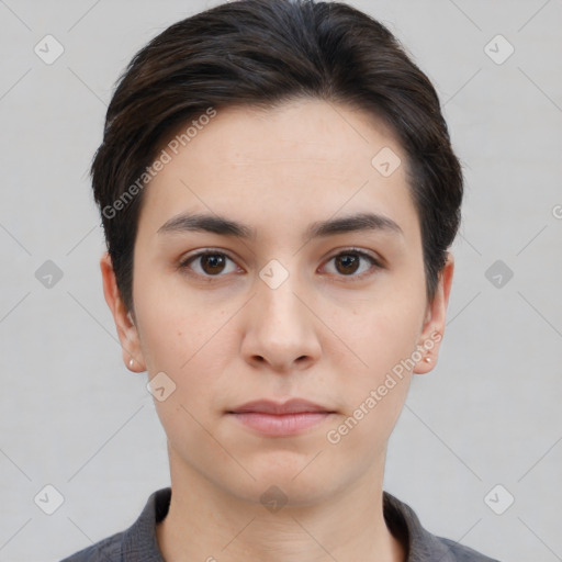 Neutral white young-adult female with short  brown hair and brown eyes