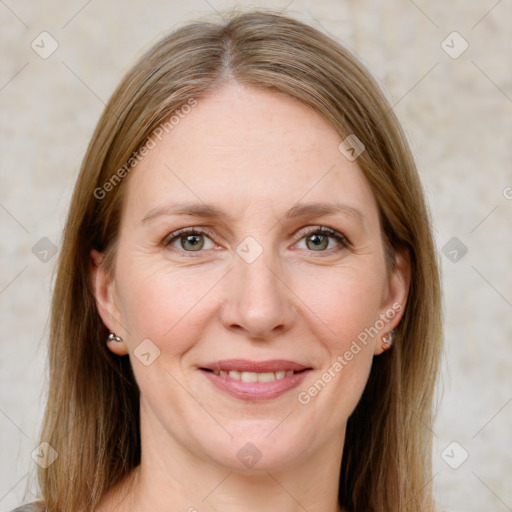 Joyful white adult female with medium  brown hair and grey eyes