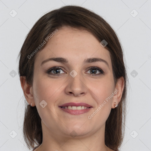 Joyful white young-adult female with medium  brown hair and grey eyes