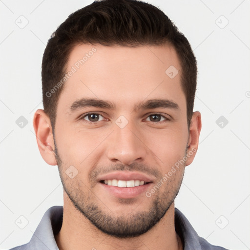 Joyful white young-adult male with short  brown hair and brown eyes