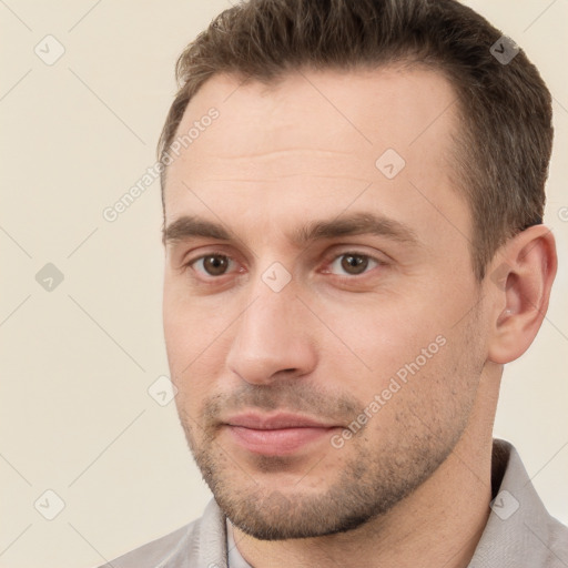 Neutral white young-adult male with short  brown hair and brown eyes