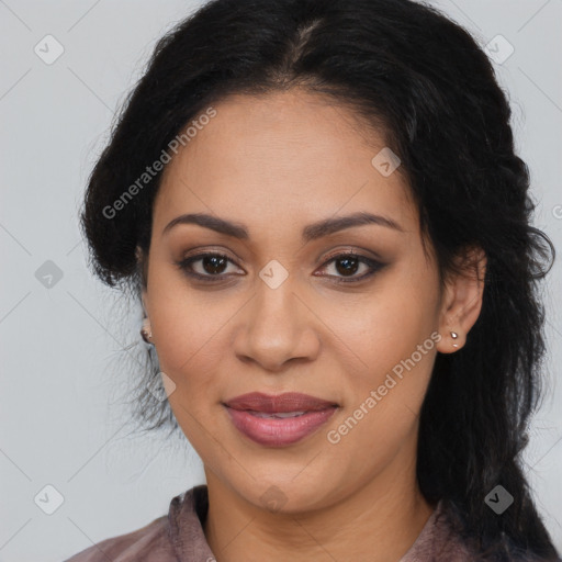 Joyful latino young-adult female with long  brown hair and brown eyes