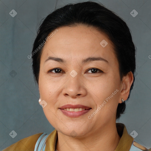 Joyful white adult female with short  brown hair and brown eyes