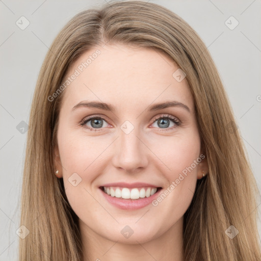 Joyful white young-adult female with long  brown hair and green eyes