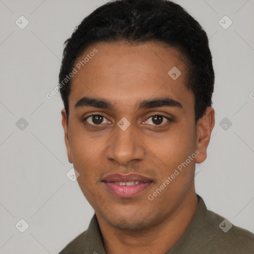 Joyful latino young-adult male with short  black hair and brown eyes