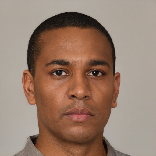 Neutral black young-adult male with short  brown hair and brown eyes