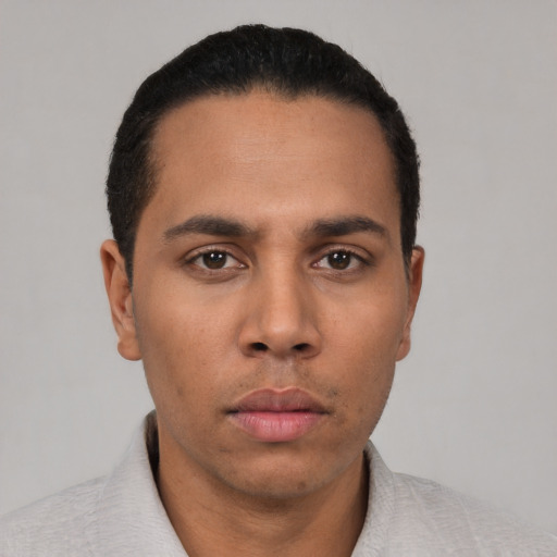 Neutral latino young-adult male with short  black hair and brown eyes