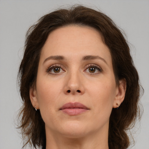 Neutral white adult female with medium  brown hair and brown eyes