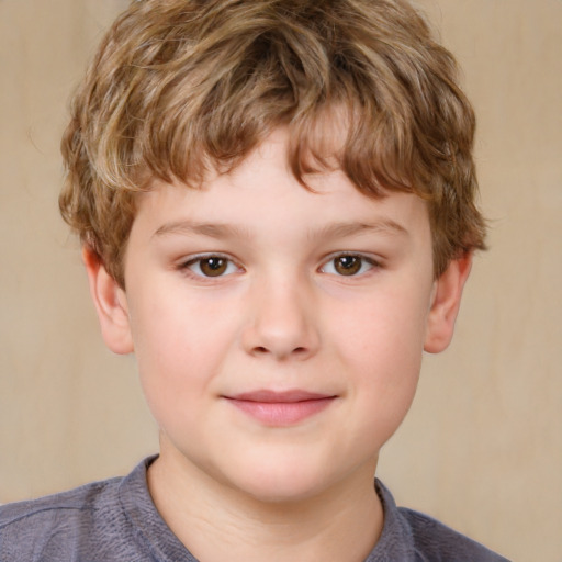 Joyful white child male with short  brown hair and brown eyes