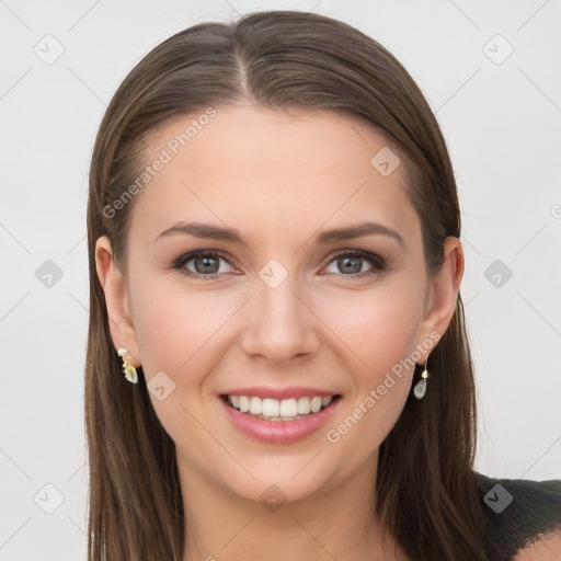 Joyful white young-adult female with long  brown hair and grey eyes