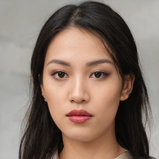 Neutral asian young-adult female with long  brown hair and brown eyes