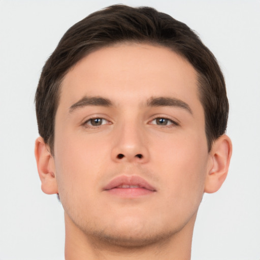 Neutral white young-adult male with short  brown hair and brown eyes