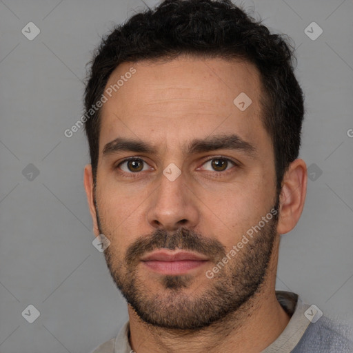 Neutral white young-adult male with short  brown hair and brown eyes