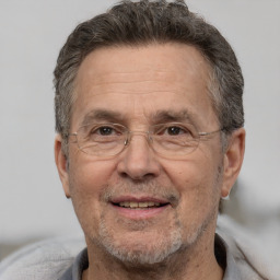 Joyful white middle-aged male with short  brown hair and brown eyes