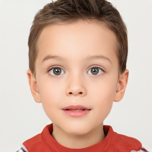 Joyful white child female with short  brown hair and brown eyes