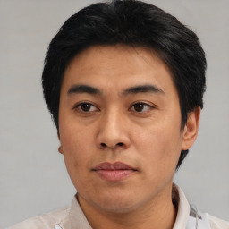 Neutral asian young-adult male with short  black hair and brown eyes