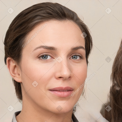 Neutral white young-adult female with medium  brown hair and brown eyes