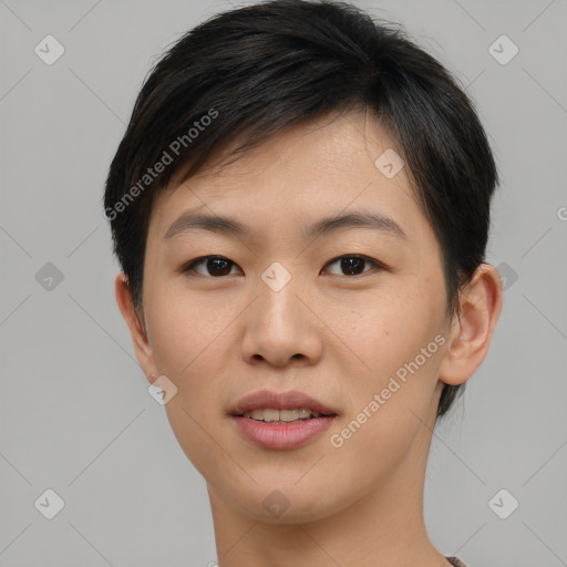 Joyful asian young-adult female with short  brown hair and brown eyes