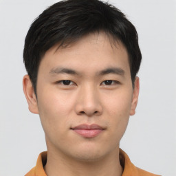 Neutral asian young-adult male with short  brown hair and brown eyes