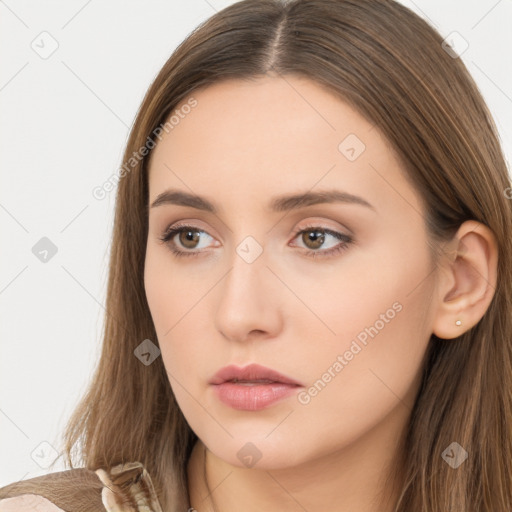 Neutral white young-adult female with long  brown hair and brown eyes