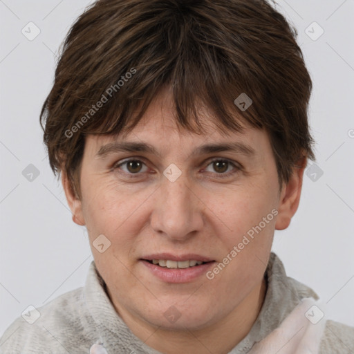 Joyful white adult female with short  brown hair and brown eyes